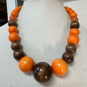 Chunky orange and wooden bead necklace